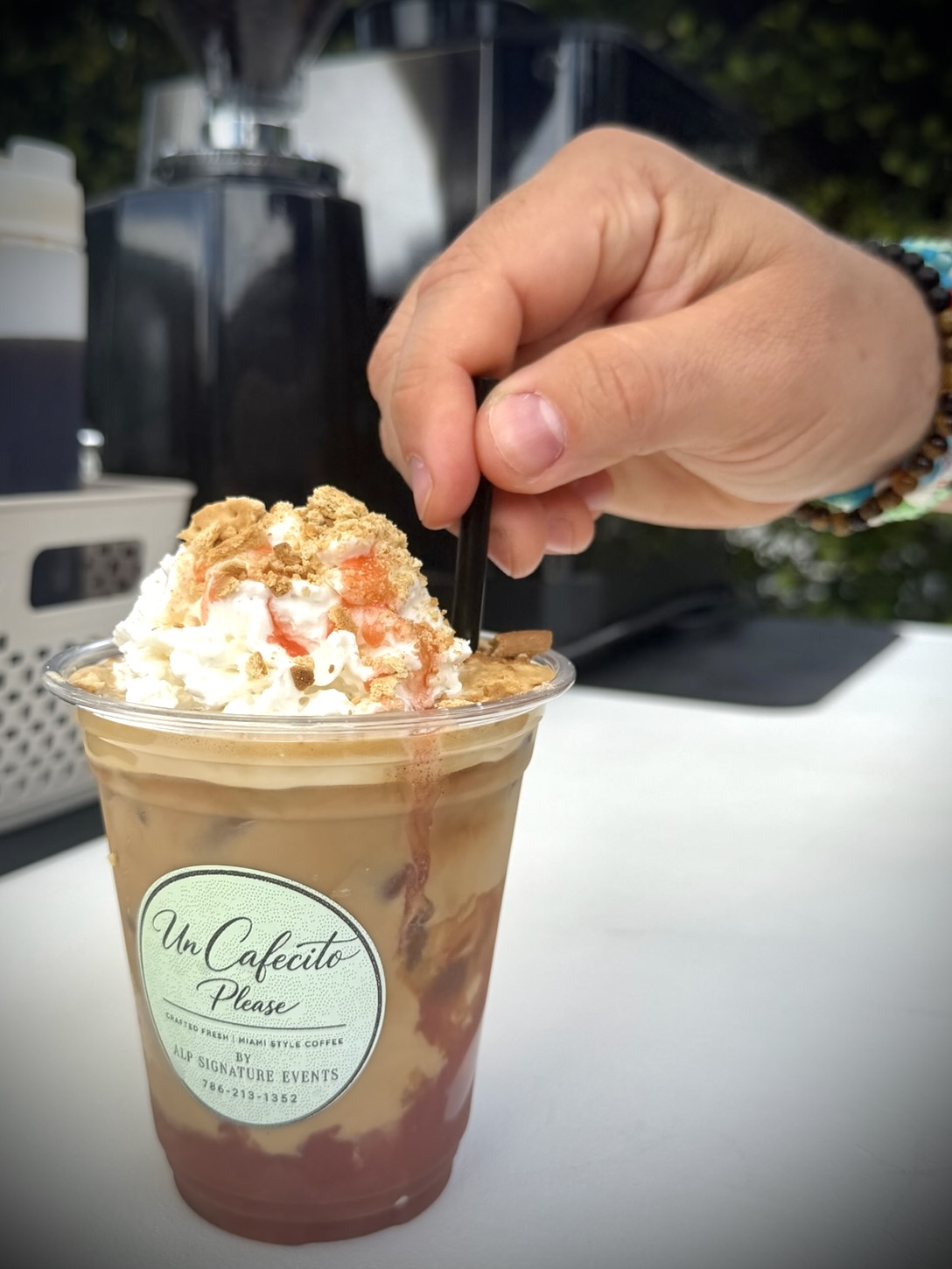 Signature iced coffee with cookie crumble and drizzle